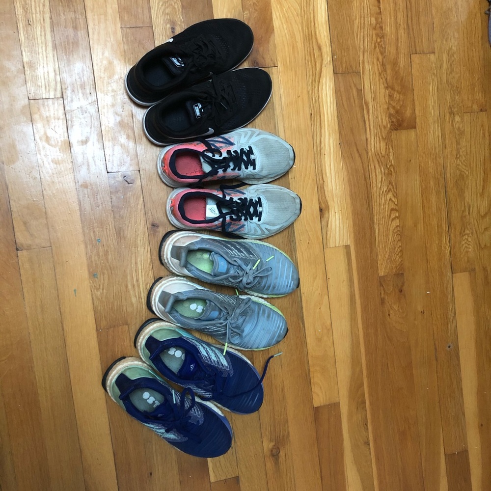 four pairs of running sneakers